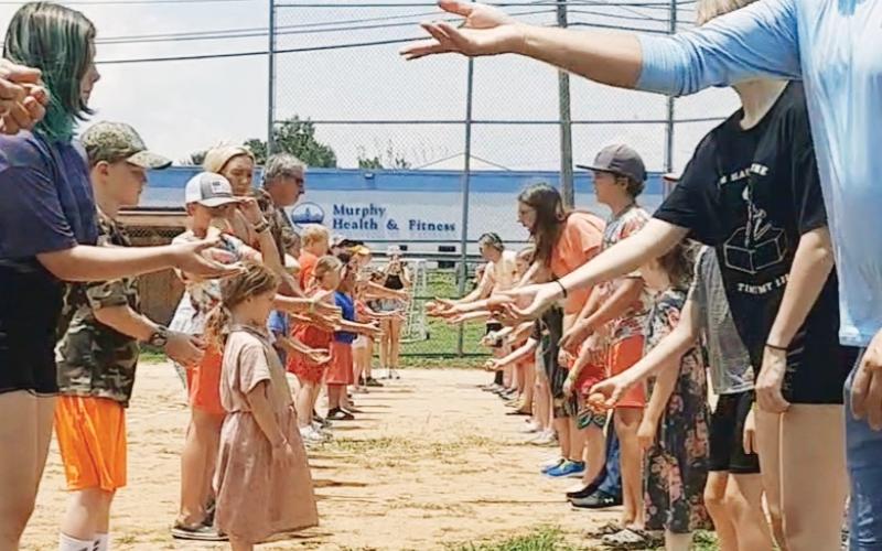 The egg toss event drew a crowd of spectators while leaving egg on others on July 1 in Murphy at the Cherokee County Hometown Celebration at Konehete Veterans Park. 