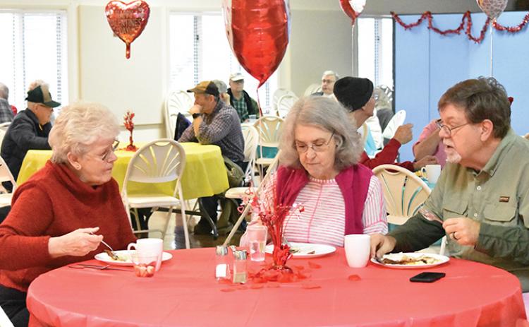 Helen Wilson, Margaret Bolick and James Bolick enjoy a meal together Saturday morning at the Konnaheeta Woman’s Club annual Sweetheart Breakfast. Photo by Samantha Sinclair