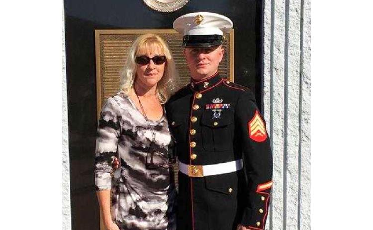 Nicole Wright/Staff Correspondent Lorrie Rooney with her son, Staff Sgt. Alan Rooney of the U.S. Marine Corps. after one of his deployments to Afghanistan. Alan took his life in November 2020. His mother honors him in her role as new director of the local nonprofit Warriors Veteran Outreach.