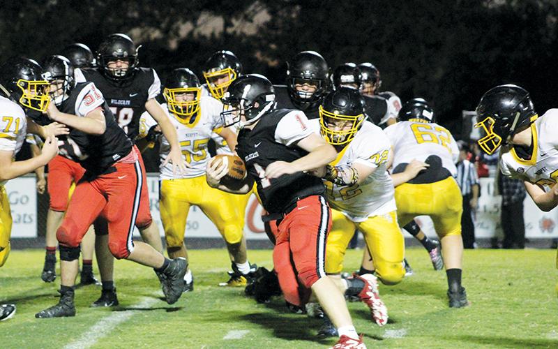 Andrews’ Andrew Martin looks to gain yardage during the Wildcats’ JV win over Murphy on Thursday.