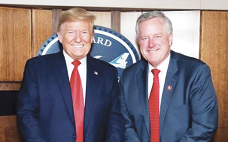 U.S. Rep. Mark Meadows (R-N.C.) meets with President Donald Trump on March 2.