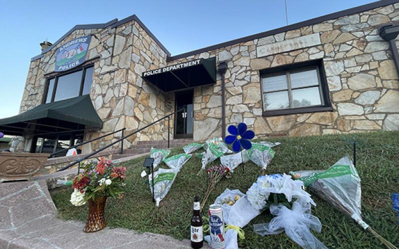  Memorials for Burrell left at the Andrews Police Station this week.