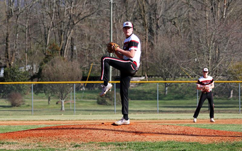 Wildcats pitcher Braxton Rickett delivers a pitch against Hayesville on March 12.