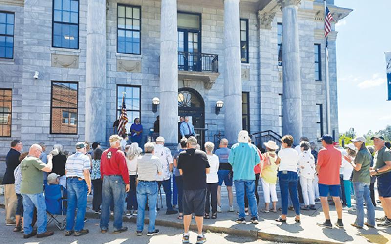 Anngee Quinones-Belian/Staff Correspondent  Folks gathered in downtown Murphy on Thursday to enjoy some singing, prayers and praises during the National Day of Prayer. The event was held on the steps of the Cherokee County Courthouse under bright and sunny skies.