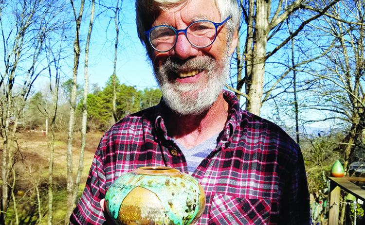 Harry Hearne creates raku pottery at Turning Point Clay Studio. Raku is only decorative, Hearne said, except for the lamps he makes. Photo by Samantha Sinclair