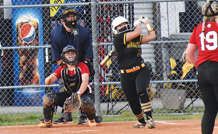 Justin Fitzgerald/sports@cherokeescout.com Murphy senior Annie Kate Dalton watches the first of her two seventh-inning homeruns go over the fence during the Lady Bulldogs’ 20-2 win over Andrews.