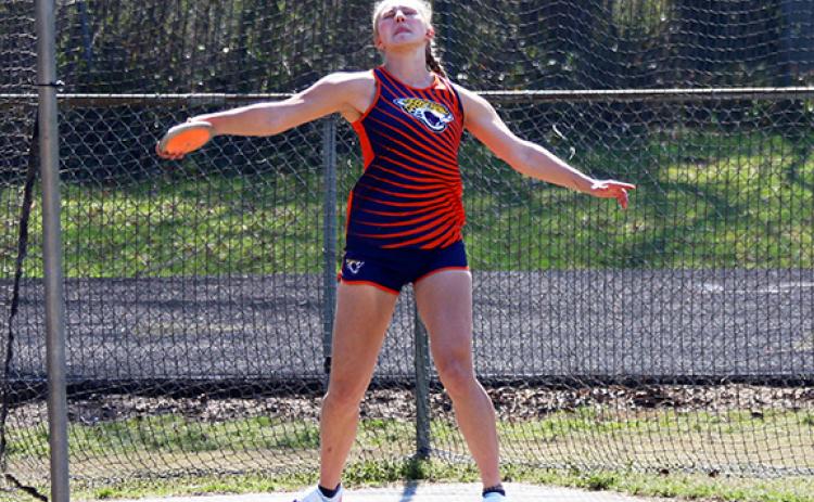 Photos by Cannon Crompton/sports@cherokeescout.com Tri-County Early College’s Jaden Crocker compete in discus, the event she won on March 20.