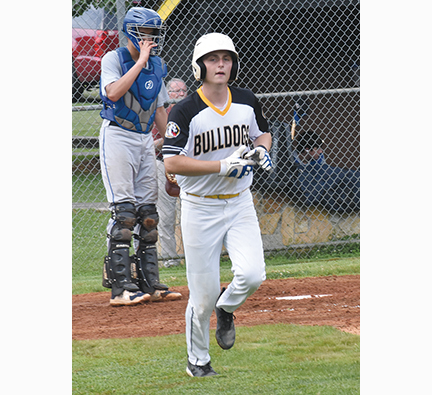 Justin Fitzgerald/sports@cherokeescout.com Murphy’s Braden Rumfelt jogs to first base after drawing a walk in the Bulldogs’ 3-1 win over Hiwassee Dam on June 11. Murphy’s season ended Thursday with an 11-3 loss to Uwharrie Charter in the second round of the 1A state playoffs.