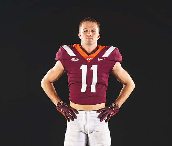 Tucker Holloway poses in his uniform for Virginia Tech football.
