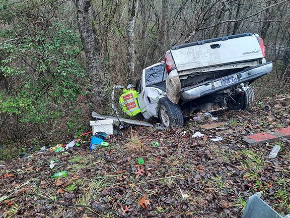 Anngee Quinones-Belian/Staff Correspondent&nbsp; Emergency personnel were called to U.S. 64 West and Caney Creek Road in Ranger for a single-vehicle accident about 9:12 a.m. Sunday. A white pickup was found to be over the guard rail of the eastbound lane after having flipped over, and the driver was taken to the hospital.&nbsp;Traffic was reduced to one lane, with a second lane of traffic being stopped briefly as a tow truck worked to position the retrieved vehicle for transport. Debris was scattered alongside the roadway, as well as over the guard rail and into the ravine below. The Ranger Fire Department and N.C. Highway Patrol worked the scene.