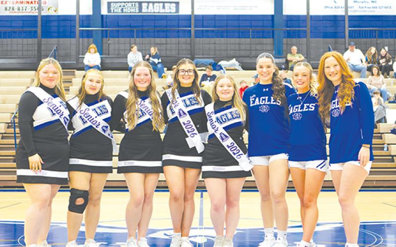 Photos by Cannon Crompton/sports@cherokeescout.com Before their games on Feb. 10, the Hiwassee Dam boys and girls varsity basketball seniors were honored along with senior cheerleaders. Left: Hiwassee Dam senior cheerleaders (from left) Jackie McGovern, Natalie Ashe, Ava Pressley, Abby Lee and Kalli Hagelin, as well as senior girls basketball players Brinkley Payne, Brooklyn Orton and Peyton Williamson were honored. Right: Hiwassee Dam varsity boys basketball players (from left) Jimmy Kelly, Dalton Kester,