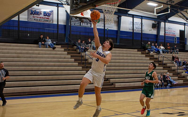 Jimmy Kelly of Hiwassee Dam goes up for a layup against Mountain Area Christian Academy on Jan. 27.