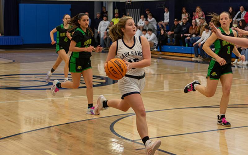 Cannon Crompton/sports@cherokeescout.com Delaney McLean of Nantahala drives to the hoop against Blue Ridge Early College on Jan. 29 in a girls varsity high school basketball game.