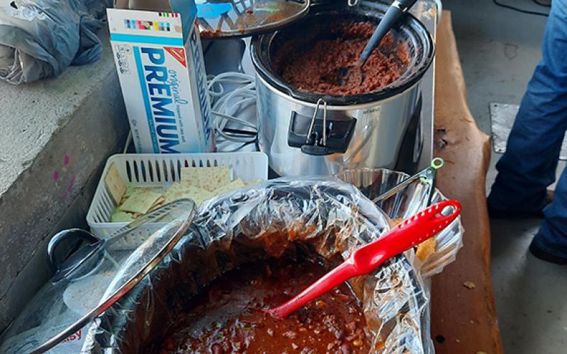 The chili cook-off brought out several warming pots filled with the tasty food and no shortage of folks wanting to sample each one.