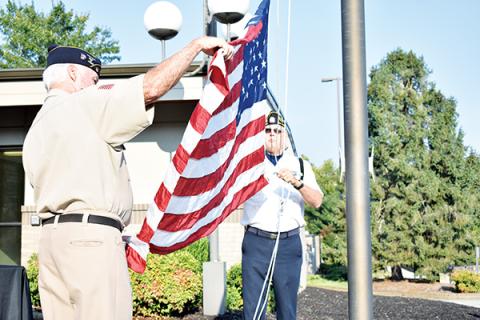 American Legion Posts 96 and 532 raised the flag to half staff on Patriot Day at Tri-County Community College.