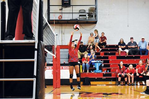 Andrews’ Kaylin Ellis sets the ball against Hiwassee Dam earlier this season.