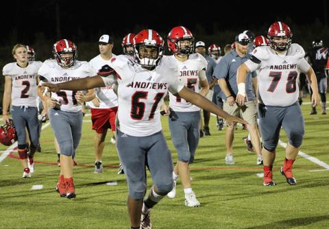 Makhi Smith (61) celebrates Andrews’ win over the North Georgia Falcons. Photo by Mary White