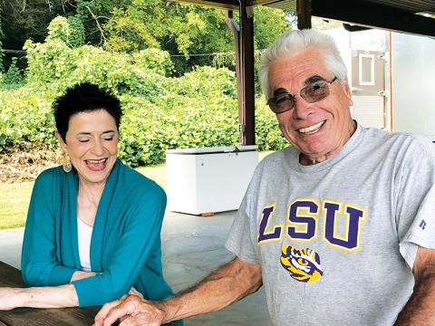 Trudy (left) and Rene Madere talk about the upcoming Cajun Fest. Photo by Penny Ray