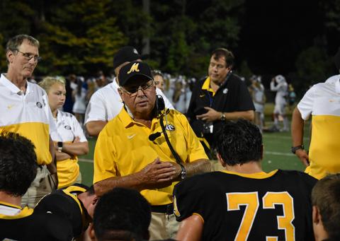 Murphy Coach David Gentry talks with the Bulldogs after beating Georgia Force Christian last week. Photo by Noah Shatzer