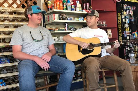 Mason Ledford (left) and Luke Logan discuss ideas for newly reopened Clay’s Corner on Old Highway 64.