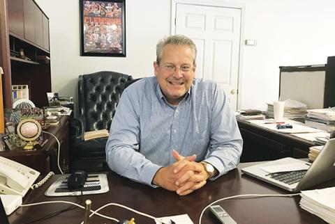 Mickey Maennle smiles as he reminisces about playing for the Wildcats in 1981, the last time Andrews beat Murphy in football.