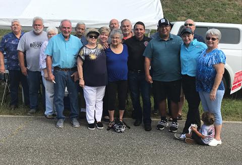 Principal Chief Richard Sneed (fifth from right, black polo shirt) visited with well-wishers in Cherokee County on Election Day for the Eastern Band of Cherokee Indians on Thursday in Marble.