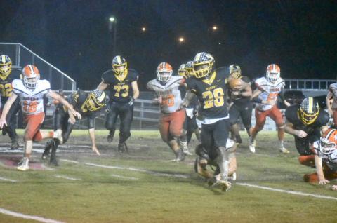 Murphy's Devonte Murray breaks free for one of his four touchdown runs against Rosman. 
