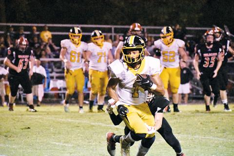 Murphy’s Abram Abling turns upfield after making a catch Friday night against Andrews. The Bulldogs ran away for the victory.