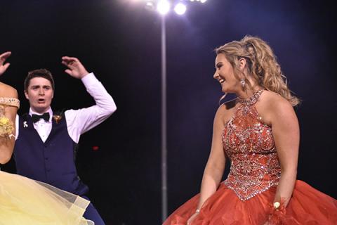 Murphy senior Alyson Palmer smiles as her escort Colton Bryant celebrates her selection as homecoming queen Friday night. Photo by Noah Shatzer