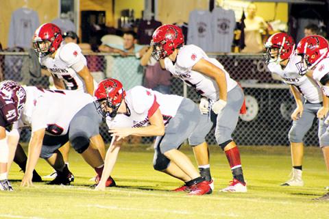 Samuel Wood and the Andrews defense lines up against Swain County on Friday. Photo by Mary White