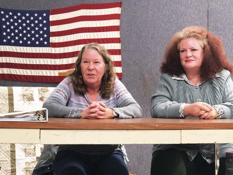 Sallie Sompayrac and Dr. Elaine Dilbeck (from left) offer support to Cherokee County trauma survivors.