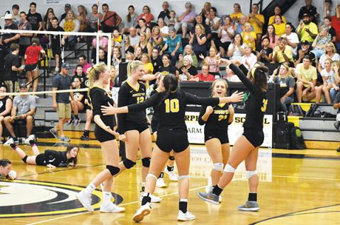 The Lady Bulldogs celebrate a point during their 3-1 victory in Murphy’s rematch against the top-ranked Robbinsville Lady Knights on Oct. 3. Poto by Noah Shatzer