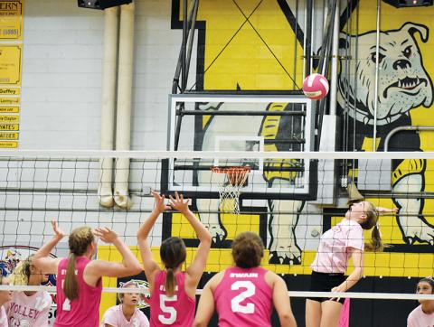 Senior Hailey Bowman rises up for a hit against the Swain County Lady Devils. 