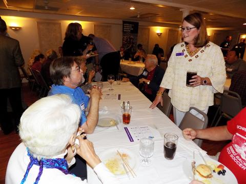 Western Carolina University Chancellor Kelli Brown was welcomed by Cherokee County alumni and community members on Oct. 8 at ShoeBooties Café in downtown Murphy. Brown is speaking to Tom O’Brien of Andrews and Marion Forsyth of Murphy. Photo by Stacy Van Buskirk