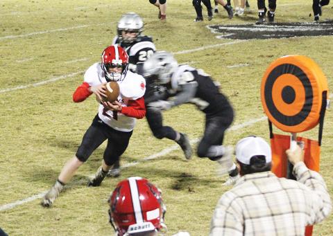 Andrews’ Isaac Weaver catches an out pass and turns it upfield for an eventual touchdown Friday in Robbinsville. Photo by Mary White