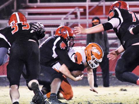 Andrews senior Makhi Smith brings down the Rosman quarterback during Friday's game. Photos by Matthew Osborne