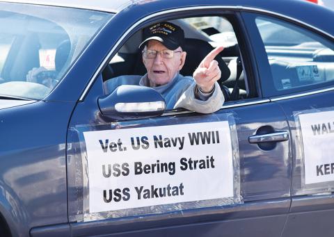 Walter Kerr, who fought in World War II and Korea, acknowledges the crowd at the inaugural Murphy Veterans Parade on Saturday. Photo by Matthew Osborne