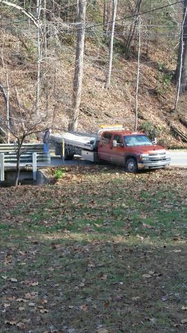 An abandoned vehicle was pulled out of a creek in Andrews Tuesday morning. (contributed photo)
