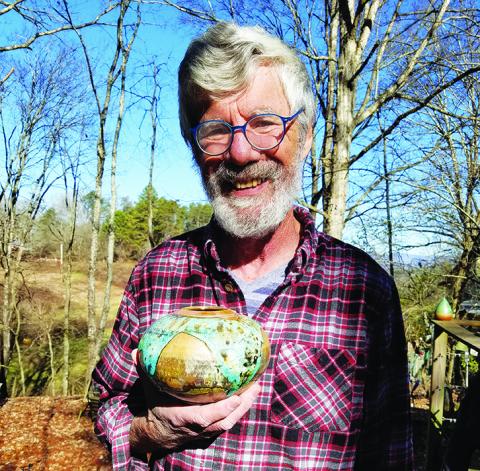 Harry Hearne creates raku pottery at Turning Point Clay Studio. Raku is only decorative, Hearne said, except for the lamps he makes. Photo by Samantha Sinclair