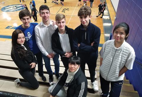 Hiwassee Dam High School has seven foreign exchange students this year – Alina Freisseis, David Roldan, Alberto Ruiz, Sebastean Poletz, Xavier Oms Baltrons, Pattaraporn Khamneungsitti and (seated) Minwoo Kim. Photo by Samantha Sinclair