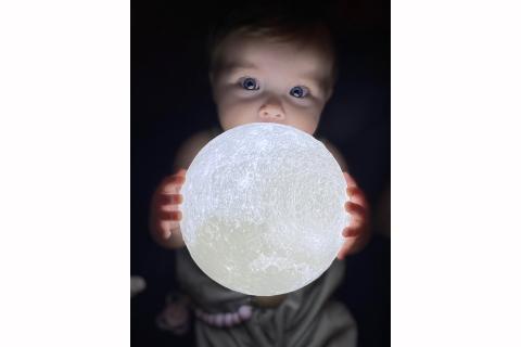 Aria Jade has never taken a bad photograph, including this one on Christmas Day while playing with the glowing moon ball she just opened.