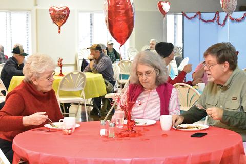 Helen Wilson, Margaret Bolick and James Bolick enjoy a meal together Saturday morning at the Konnaheeta Woman’s Club annual Sweetheart Breakfast. Photo by Samantha Sinclair