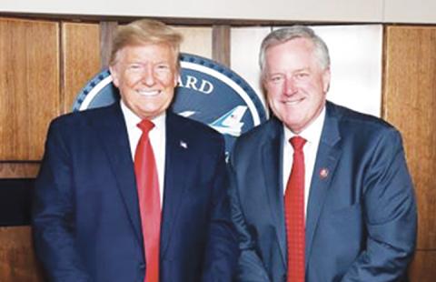 U.S. Rep. Mark Meadows (R-N.C.) meets with President Donald Trump on March 2.