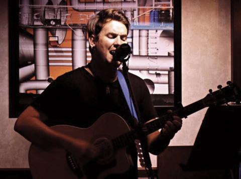 Nate Goodlet of Murphy performs in the pub on a cruise ship before COVID-19 hit.