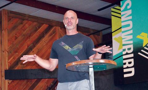 Snowbird lead pastor Brody Holloway preaches during a worship service inside the music hall adjacent to the former Bear Ridge Mall off U.S. 19/74. Photo by Penny Ray