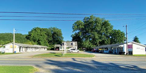 Murphy Power Board has offered to purchase the property next to a building they already own on Hill Street to help keep crews isolated during the panemic. General Manager Larry Kernea said the utility will help those renting space. Photo by David Brown