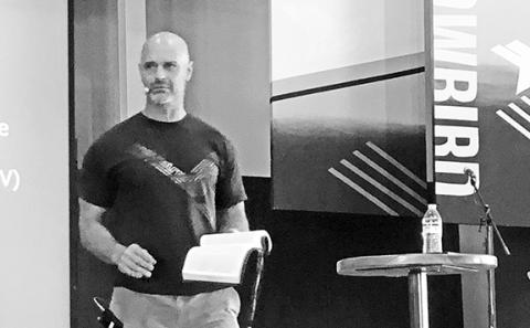 Brody Holloway speaks at Snowbird Wilderness Outfitters.