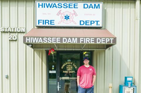 Gabe Stark and watchdog Kobe were manning the Hiwassee Dam Volunteer Fire Department last week. The department is acquiring 2.79 acres of county-owned property.