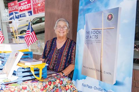 Author Paula Massie Oneal was on hand during Art Walk on Friday with copies of her latest work, The Book of Acts: The Continuing Acts of Christ, Through the Apostles, Inspired by the Holy Spirit.