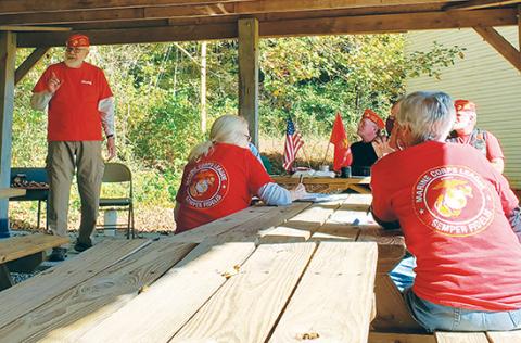 Samantha Sinclair/scoutingaround@cherokeescout.com John Evans, Marine Corps League member and former Cherokee County Toys for Tots coordinator, explains to the local detachment the needs of Toys for Tots this year during the detachment’s October meeting.